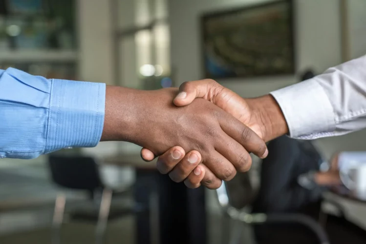 Two People Shaking Hands